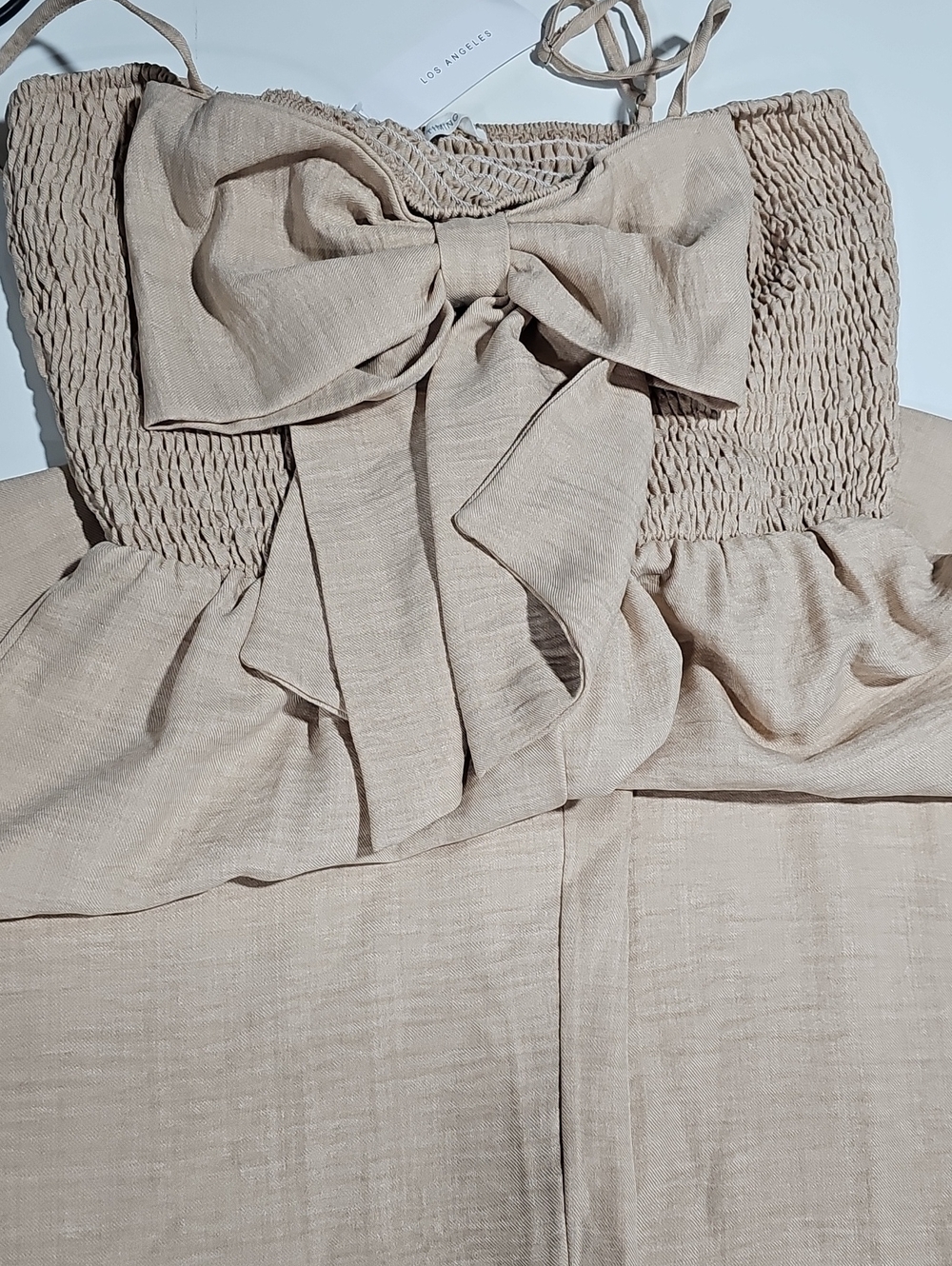 Los Angeles Apparel Neutral Beige Bow-Front Smocked Jumpsuit